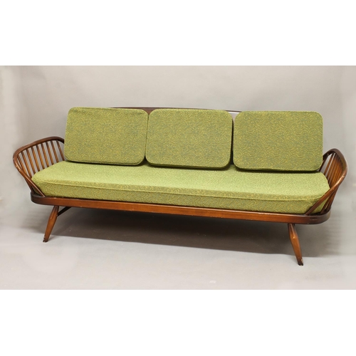 1005 - ERCOL VINTAGE STUDIO COUCH/DAY BED Model No 355 and designed by Lucian Ercolani for Ercol, the dark ... 