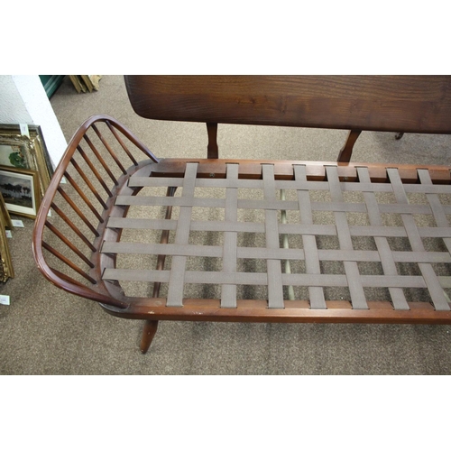 1005 - ERCOL VINTAGE STUDIO COUCH/DAY BED Model No 355 and designed by Lucian Ercolani for Ercol, the dark ... 