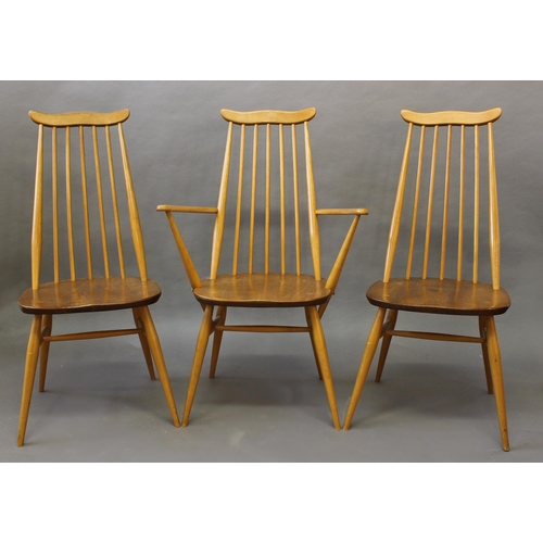 1007 - ERCOL DINING CHAIRS a set of four vintage light elm and beech stick back chairs (two carvers and two... 