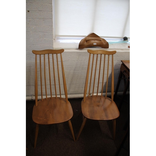 1007 - ERCOL DINING CHAIRS a set of four vintage light elm and beech stick back chairs (two carvers and two... 