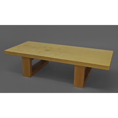 1010 - DEVON GUILD OF CRAFTSMEN - SYCAMORE COFFEE TABLE a low coffee table with a rectangular top supported... 