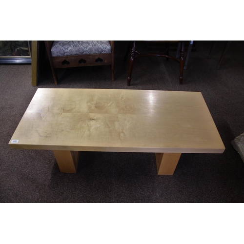 1010 - DEVON GUILD OF CRAFTSMEN - SYCAMORE COFFEE TABLE a low coffee table with a rectangular top supported... 