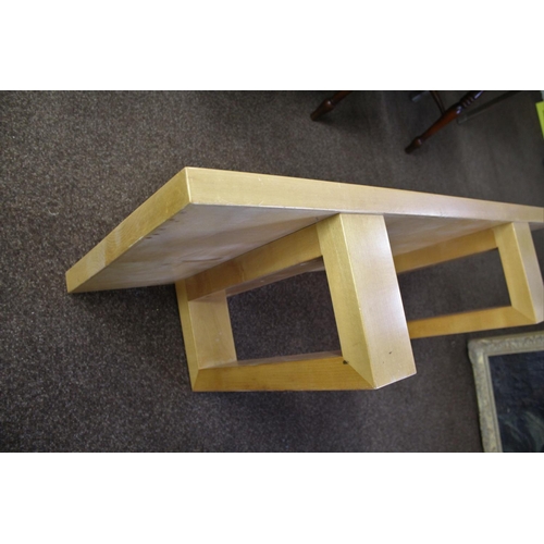 1010 - DEVON GUILD OF CRAFTSMEN - SYCAMORE COFFEE TABLE a low coffee table with a rectangular top supported... 