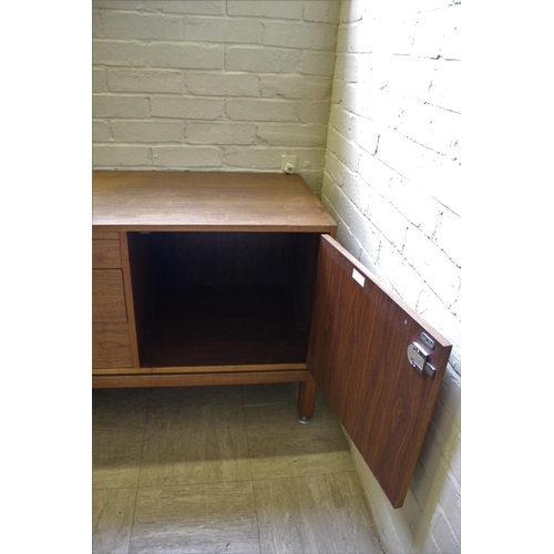 1015 - JENS RISOM MID CENTURY SIDEBOARD - DANISH a teak sideboard with three central drawers flanked by two... 