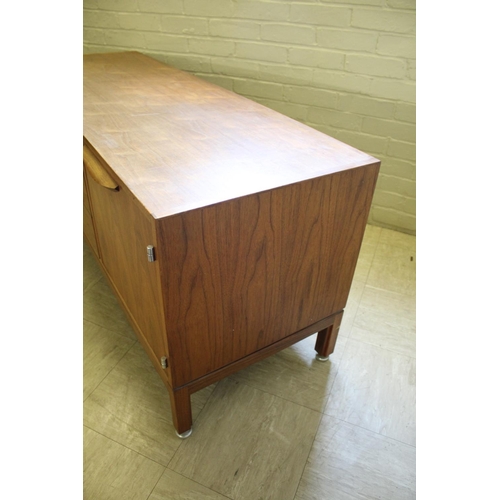 1015 - JENS RISOM MID CENTURY SIDEBOARD - DANISH a teak sideboard with three central drawers flanked by two... 