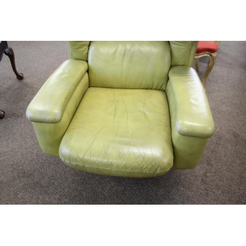 1018 - RETRO LEATHER SWIVEL CHAIR circa 1970's, a lime green leather chair of generous proportions and supp... 