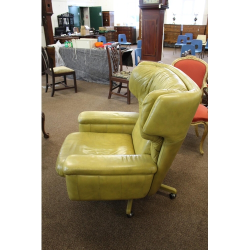 1018 - RETRO LEATHER SWIVEL CHAIR circa 1970's, a lime green leather chair of generous proportions and supp... 