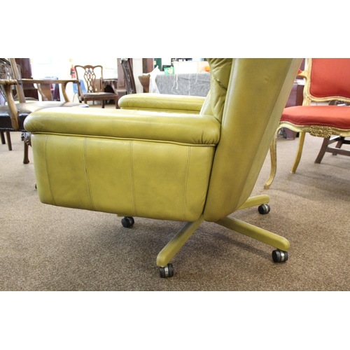 1018 - RETRO LEATHER SWIVEL CHAIR circa 1970's, a lime green leather chair of generous proportions and supp... 