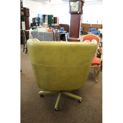 1018 - RETRO LEATHER SWIVEL CHAIR circa 1970's, a lime green leather chair of generous proportions and supp... 