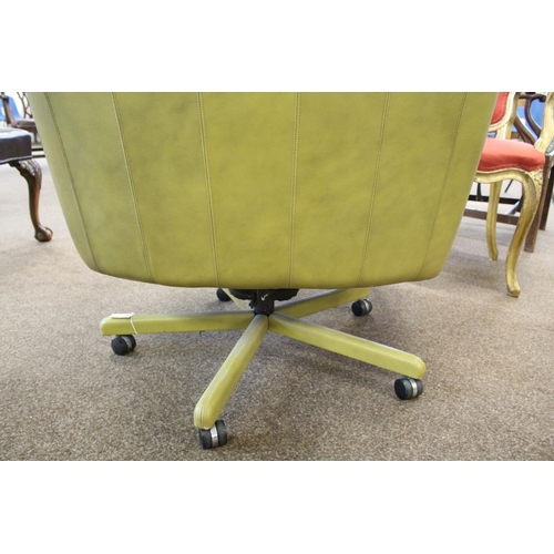 1018 - RETRO LEATHER SWIVEL CHAIR circa 1970's, a lime green leather chair of generous proportions and supp... 