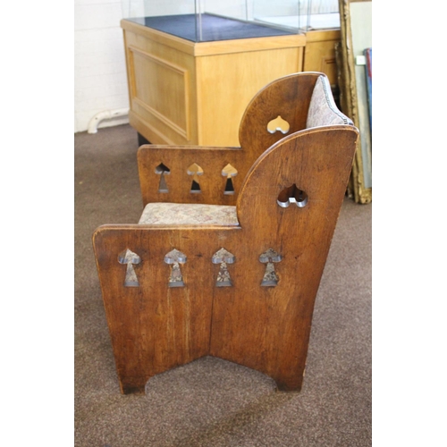 1020 - ARTS & CRAFTS ARMCHAIR - GOODYERS circa 1900, the oak armchair with heart and club motifs to each si... 