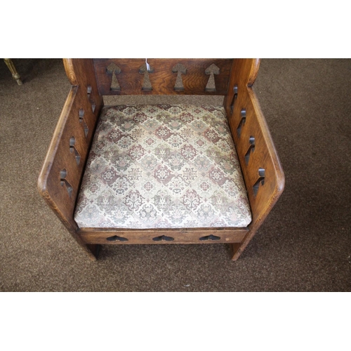 1020 - ARTS & CRAFTS ARMCHAIR - GOODYERS circa 1900, the oak armchair with heart and club motifs to each si... 