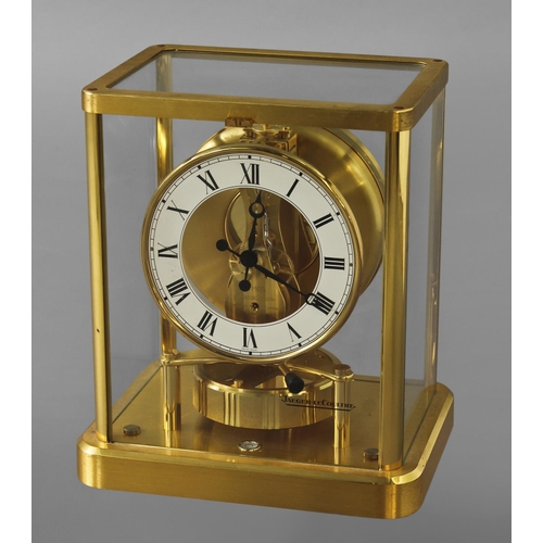 1584 - A JAEGER LE COULTRE ATMOS CLOCK, of traditional design with glass and brass case, the mechanism mark... 