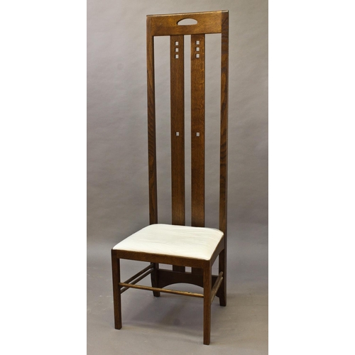 1023 - MACKINTOSH STYLE OAK HIGH BACK CHAIR a modern oak high back chair with cut out sections to each spla... 