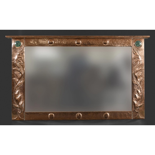 1024 - LARGE ARTS & CRAFTS COPPER MIRROR hand beaten and of rectangular shape with a top rail, inset with t... 