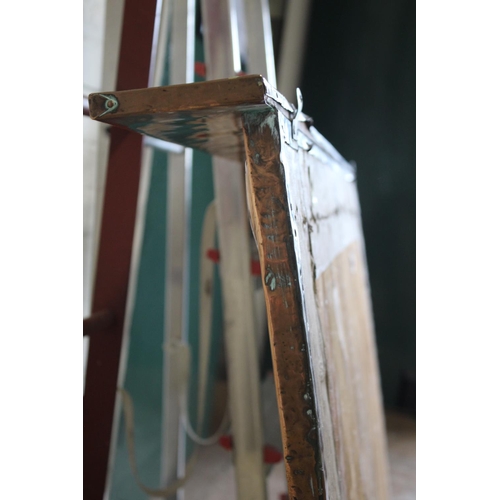 1024 - LARGE ARTS & CRAFTS COPPER MIRROR hand beaten and of rectangular shape with a top rail, inset with t... 