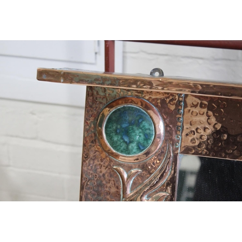 1024 - LARGE ARTS & CRAFTS COPPER MIRROR hand beaten and of rectangular shape with a top rail, inset with t... 