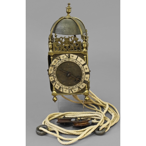 1599 - A BRASS LANTERN CLOCK SIGNED 'STAFFORD FREEMAN' LONDON, the silvered chapter ring with Roman numeral... 