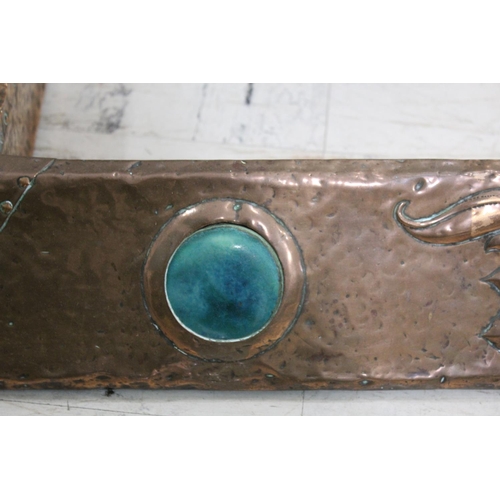 1025 - ARTS & CRAFTS COPPER FENDER a hand beaten fender with exposed rivets, with three Ruskin style rounde... 