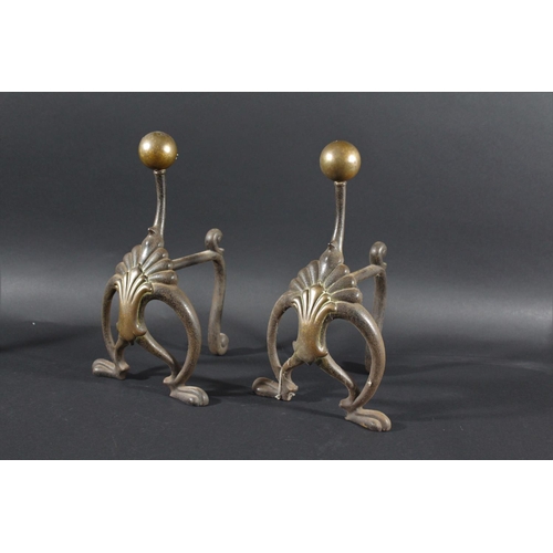 1033 - PAIR OF ART NOUVEAU FIRE DOGS - WILLIAM TONKS a pair of brass and iron fire dogs with brass roundels... 