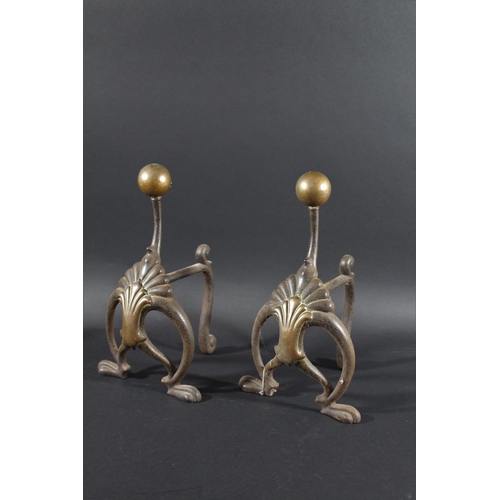 1033 - PAIR OF ART NOUVEAU FIRE DOGS - WILLIAM TONKS a pair of brass and iron fire dogs with brass roundels... 