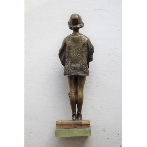 1038 - FRIEDRICH GOLDSCHEIDER BRONZE a small bronze figure of a boy in a Court uniform, and holding a book ... 