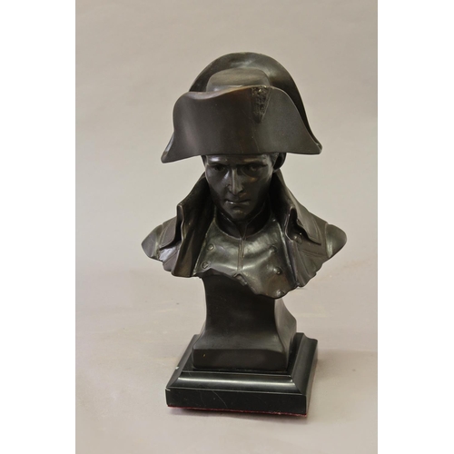 1699 - A BRONZE BUST OF NAPOLEON, head and shoulders, wearing his hat and with open collar, on a tapering s... 