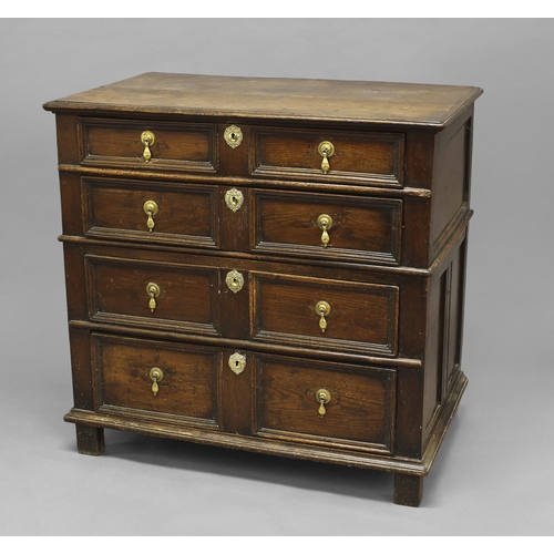 1715 - A LATE 17TH OR EARLY 18TH CENTURY TWO PART CHEST OF DRAWERS, the rectangular top with a moulded edge... 