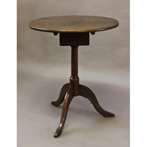 1734 - AN UNUSUAL 18TH CENTURY OAK PEDESTAL TABLE, with a circular four plank top on a revolving modified '... 