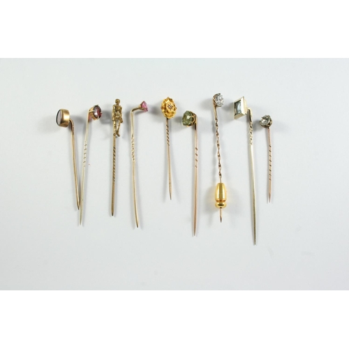 680 - FORTY TWO ASSORTED STICK PINS a carved lava cameo stick pin, depiciting the bust of a lady, a gold s... 