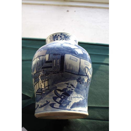 1262 - 19THC CHINESE TEMPLE JAR & COVER a large porcelain jar and cover of baluster shape, the blue and whi... 