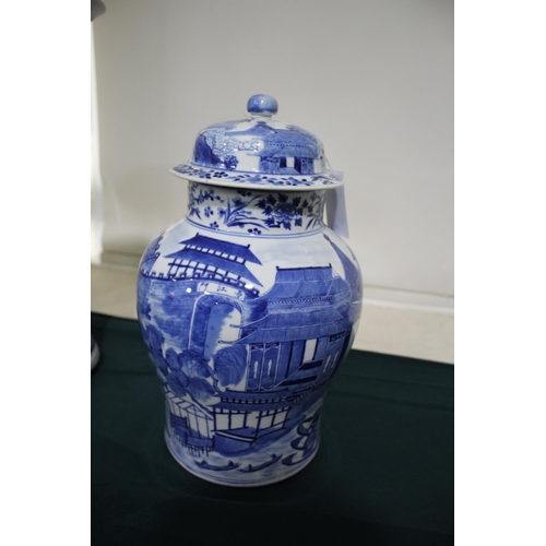 1262 - 19THC CHINESE TEMPLE JAR & COVER a large porcelain jar and cover of baluster shape, the blue and whi... 