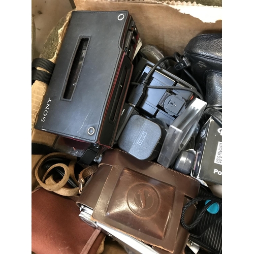 589 - Two Boxes of Camera Equipment and a Stand