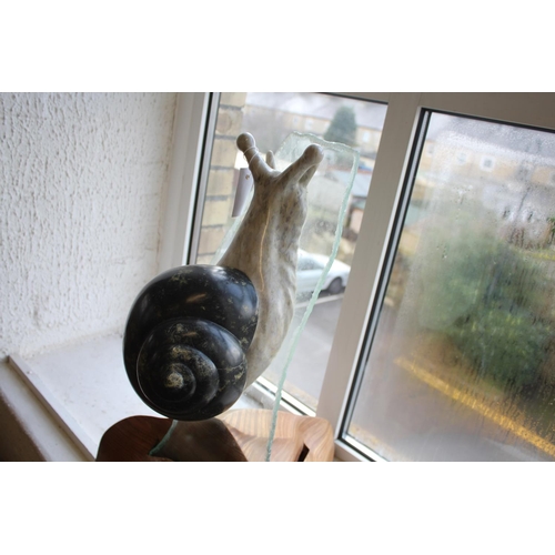 1032 - CONTEMPORARY MARBLE & GLASS SCULPTURE - SNAILS an interesting group of three marble snails, each mou... 