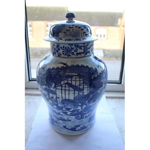 1262 - 19THC CHINESE TEMPLE JAR & COVER a large porcelain jar and cover of baluster shape, the blue and whi... 