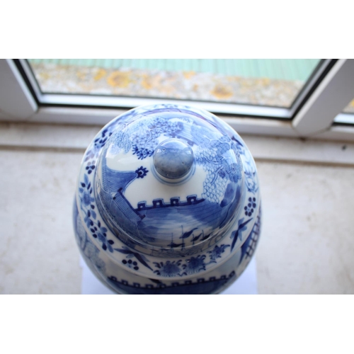 1262 - 19THC CHINESE TEMPLE JAR & COVER a large porcelain jar and cover of baluster shape, the blue and whi... 