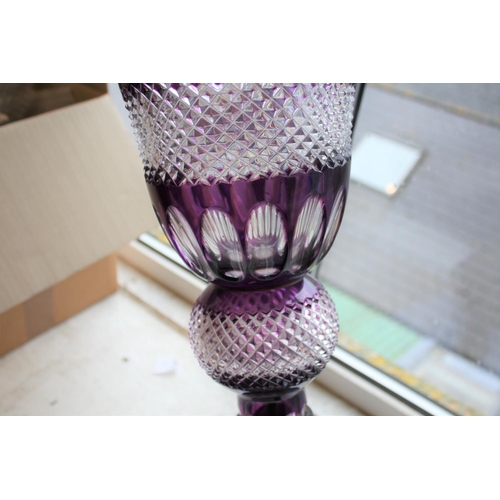 1110 - LARGE BOHEMIAN PURPLE GLASS VASE & METAL STAND an unusually large purple and clear glass vase of fla... 