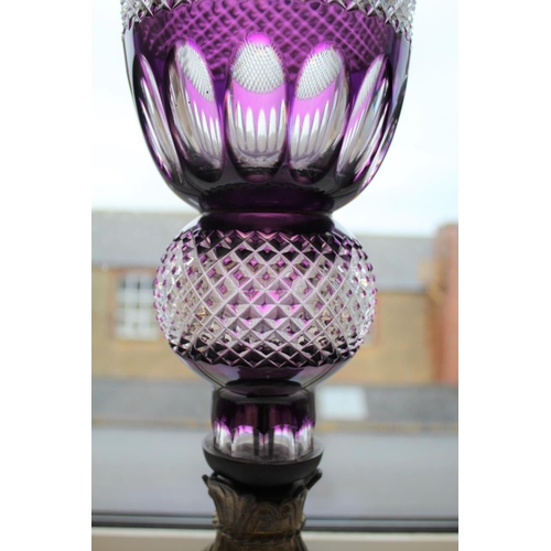 1110 - LARGE BOHEMIAN PURPLE GLASS VASE & METAL STAND an unusually large purple and clear glass vase of fla... 