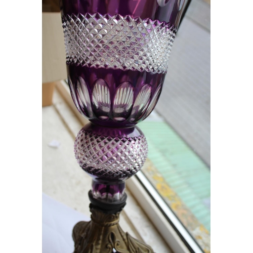 1110 - LARGE BOHEMIAN PURPLE GLASS VASE & METAL STAND an unusually large purple and clear glass vase of fla... 