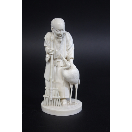 1265 - IVORY OKIMONO OF AN ELDERLY MAN & CRANE - SIGNED
a Meiji period figure of a bearded gentleman, sligh... 