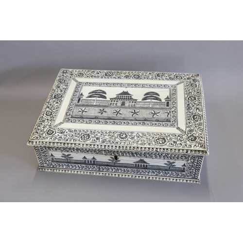 1704 - A FINE INDIAN VIZAGAPATAM WORK BOX.
A fine Indian ivory veneered and pen work box, the rectangular l... 