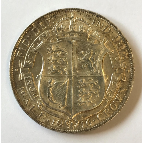 1164 - A GEORGE V HALFCROWN. A George V Halfcrown dated 1916.