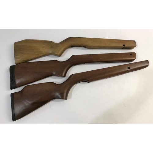 366 - THREE WOODEN AIR RIFLE STOCKS. Three various wooden Air Rifle stocks, two with rubber shoulder mount... 