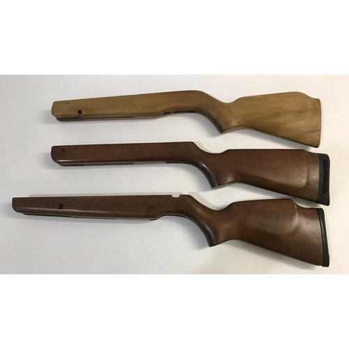 366 - THREE WOODEN AIR RIFLE STOCKS. Three various wooden Air Rifle stocks, two with rubber shoulder mount... 