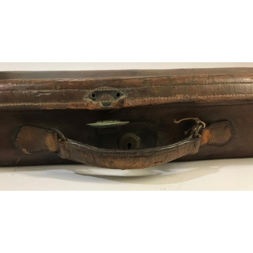 381 - A LARGE LEATHER GUN CASE. A leather gun case, marked 'Lt. Col. J.K. Gordon R.A.' interior lacking, 1... 