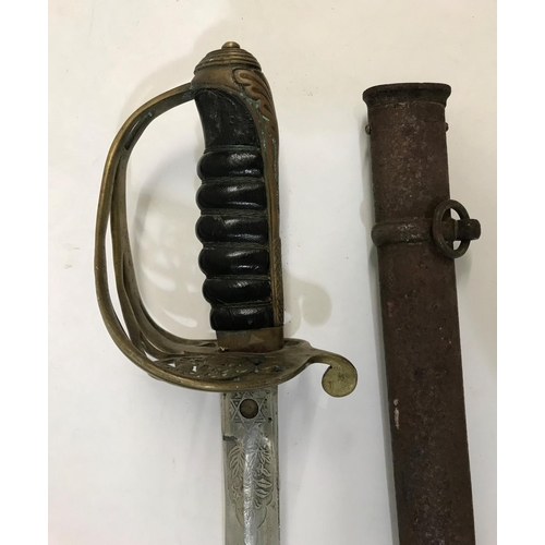 398 - A VICTORIAN 1854 PATTERN INFANTRY OFFICERS SWORD. With a pointed single edged, partially fullered 82... 