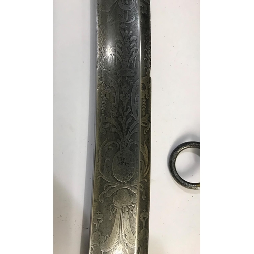 417 - A PRE 1803 REGULATION LIGHT COMPANY SABRE. With a 71cm curved single sided pointed blade elaborately... 