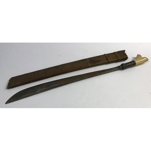 431 - A BORNEO HEAD HUNTERS SWORD AND SCABBARD. A Dyack type sword and scabbard, the curving 53cm one side... 