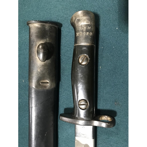 438 - A BRITISH 1907 PATTERN BAYONET AND SCABBARD. A 1907 Pattern bayonet with a 43cm fullered blade stamp... 