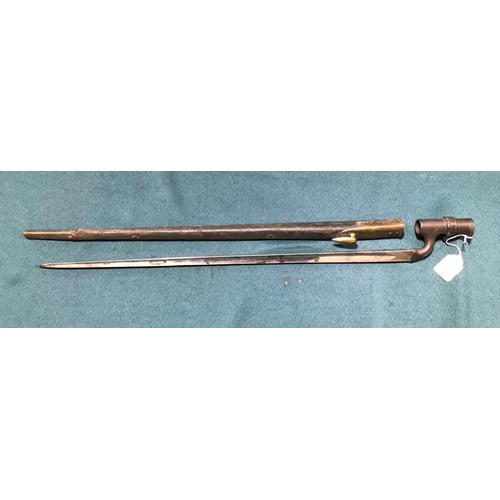 439 - AN 1876 PATTERN BAYONET AND SCABBARD.  A British 1876 Pattern Socket Bayonet with a 55cm triangular ... 